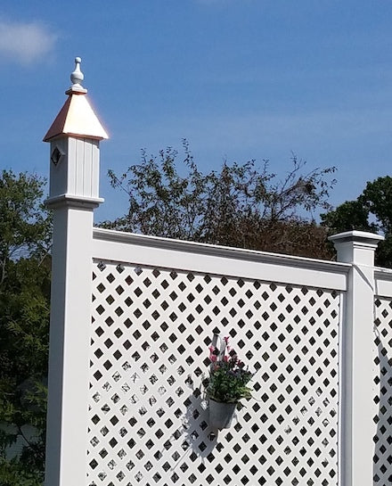 Copper and Vinyl bluebird house mounted on fence 