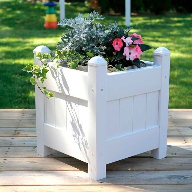 16" White Vinyl Planter Box – Durable, UV-stabilized, and weather-resistant for patios, decks, and gardens. Classic slatted design with pyramidal caps. Tool-free assembly, fits 12" pots or direct planting. Low-maintenance and built to last.