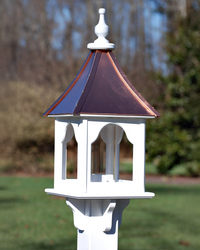 Handcrafted Unique Vinyl Bird Feeder with copper roof options, made from durable cellular expanded PVC. Features lift-off roof, heavy-duty acrylic tube (3" x 9"), and decorative brackets. Guaranteed maintenance-free with no rotting, cracking, or fading. USA-made, fits 4x4 post. Free shipping!