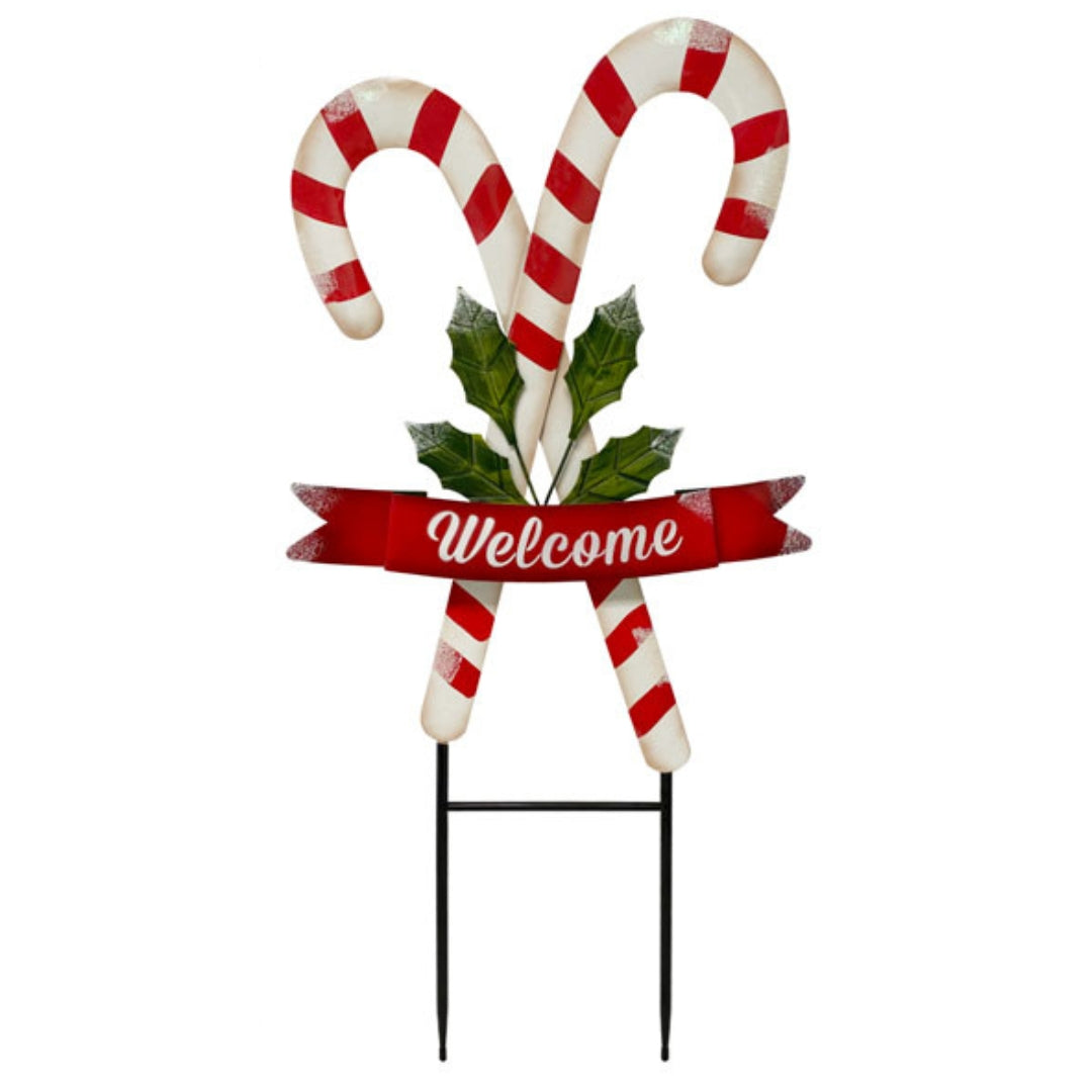 Land & Sea metal candy cane yard art, 34 inches tall, ideal for brightening up your outdoor holiday decor.