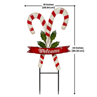 Land & Sea metal candy cane yard art, 34 inches tall, ideal for brightening up your outdoor holiday decor.