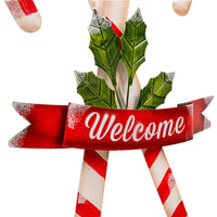 Land & Sea metal candy cane yard art, 34 inches tall, ideal for brightening up your outdoor holiday decor.