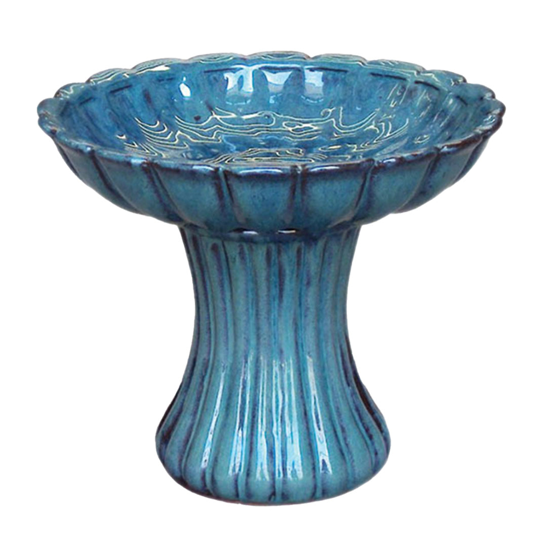 Elegant ceramic bird bath with pedestal design for attracting birds