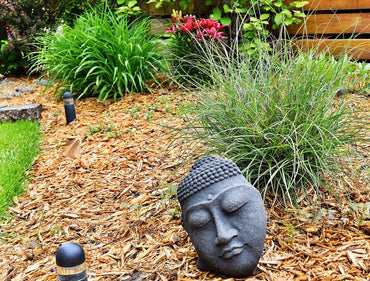 Buddha Face sculpture in the garden
